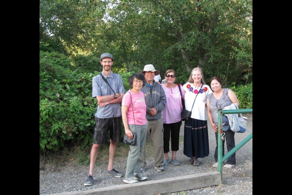 The flock of bird watchers begin to arrive for the Garden City Conservation Society’s bird walk in Garden City Park in August.