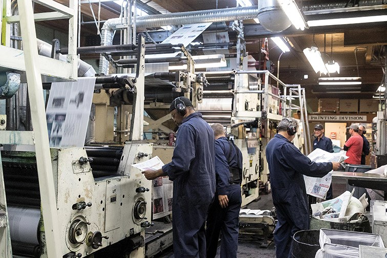 Pressmen do quality checks to the newspaper on Friday evening at the Citizen press building while printing the final copy of the daily edition of the Prince George Citizen newspaper. Citizen Photo by James Doyle