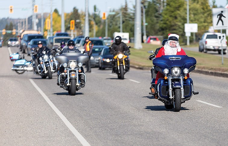 Santa Claus leads the pack on Sunday afternoon during the 38th Annual Motorcycle Toy Run in support of the Salvation Army’s Christmas hamper program. Citizen Photo by James Doyle
