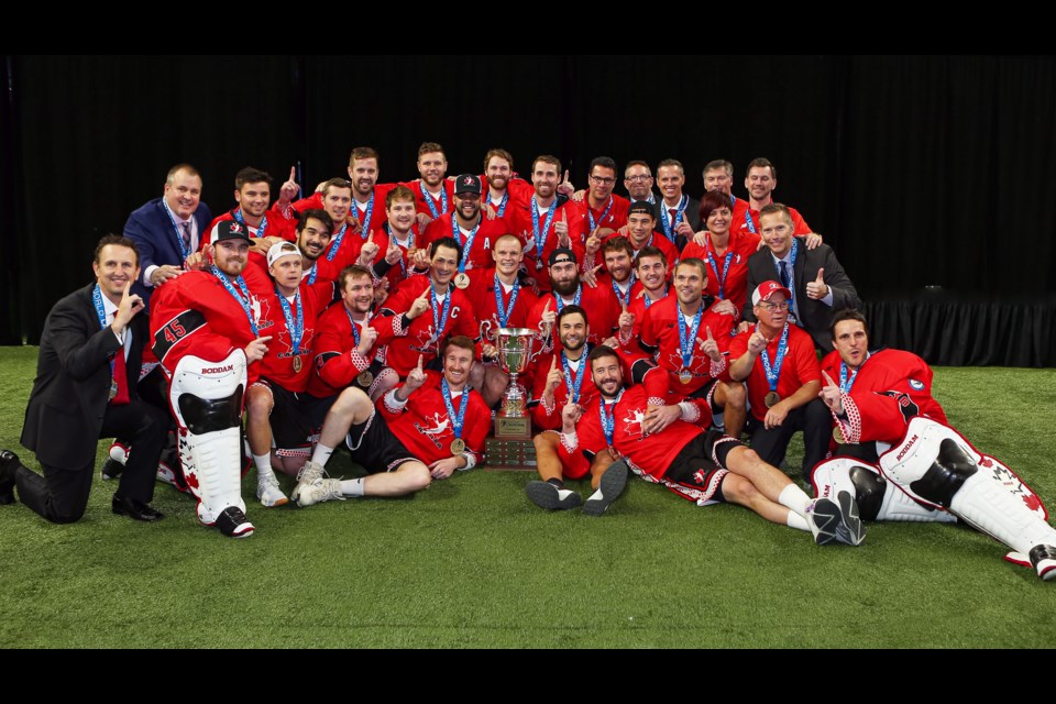 Team Canada celebrates after defeating the Iroquois Nationals in the Indoor Lacrosse World championships last week in Langley.