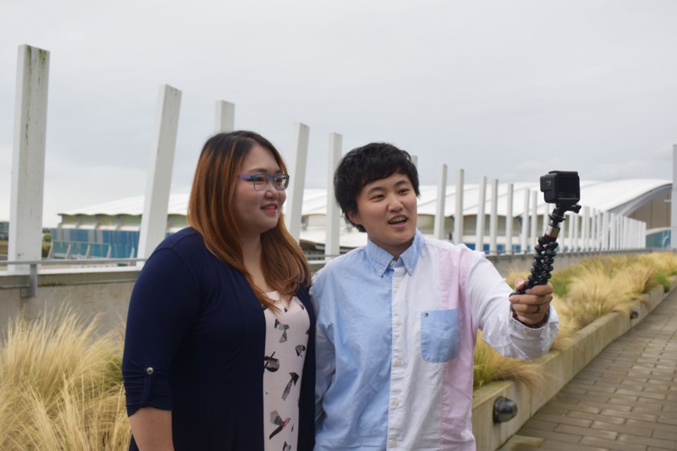 Vivian Li(left) and Zoe Wong always carry their shooting requirements wherever they go. Nono Shen photo