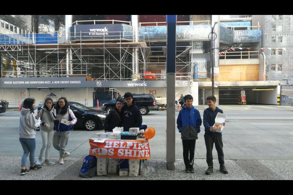 Palmer secondary students selling Krispy Kremes in aid of BC Children's Hospital. Photos submitted