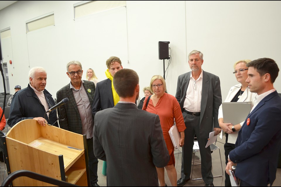 The candidates gather prior to the debates Wednesday night.