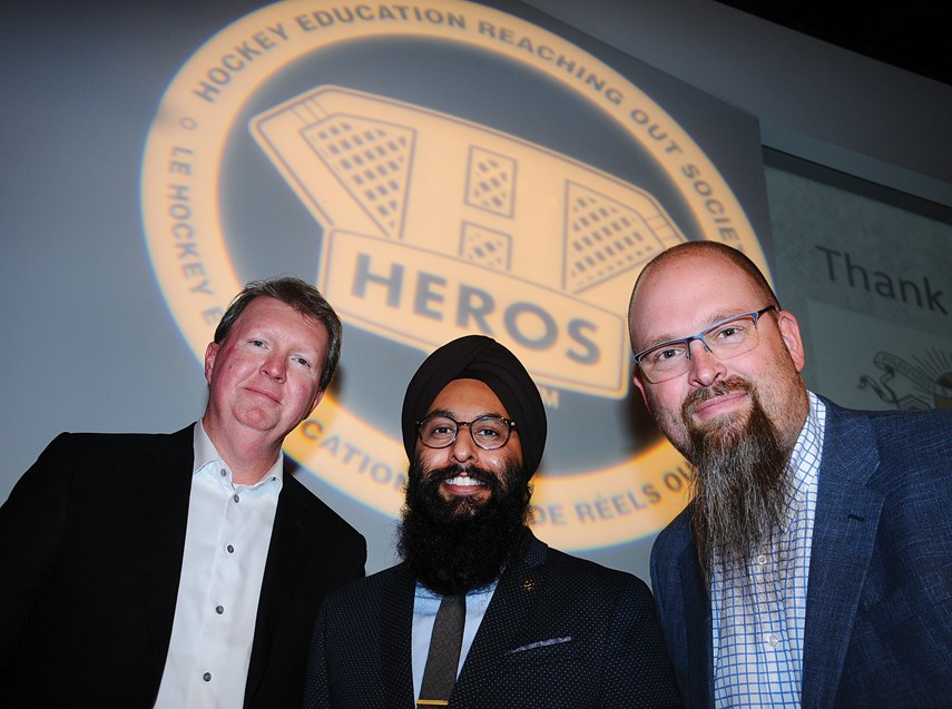 HEROS Board member Kevin Klippenstein, MC Harnarayan Singh, host of the Punjabi-language broadcast of Hockey Night in Canada, and HEROS employee Kevin Hodgson.
