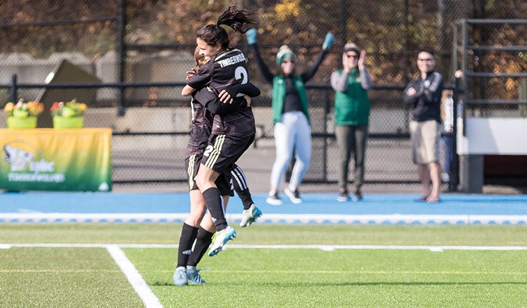 UNBC Timberwolves player Sofia Jones gets swarmed by teammate Julia Babicz after scoring a goal against the UFV Cascades on Sunday afternoon at Masich Place Stadium. Citizen Photo by James Doyle