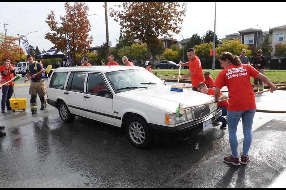 Richmond firefighters hosted a charity car wash Sunday. Photos by Boaz Joseph/Special to the News