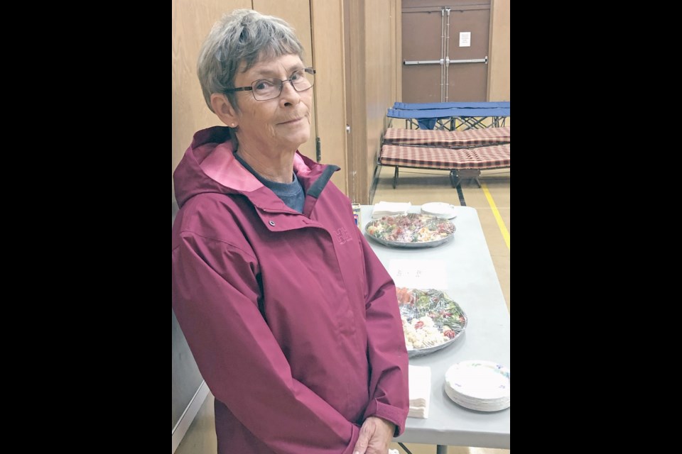 In Sayward's recreation centre, Sharon Batch ensures Tour de Rock cyclists have something to eat.