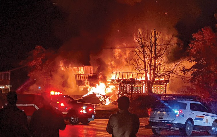 Crews attend to a structure fire on Abhau Street and Chilako Avenue on Saturday night. Photo courtesy of Merlissa Webber