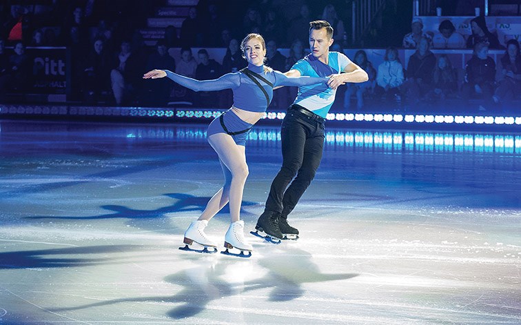 Carolina Kostner and Patrick Chan perform during Rock the Rink at CN Centre on Saturday night. Citizen Photo by James Doyle