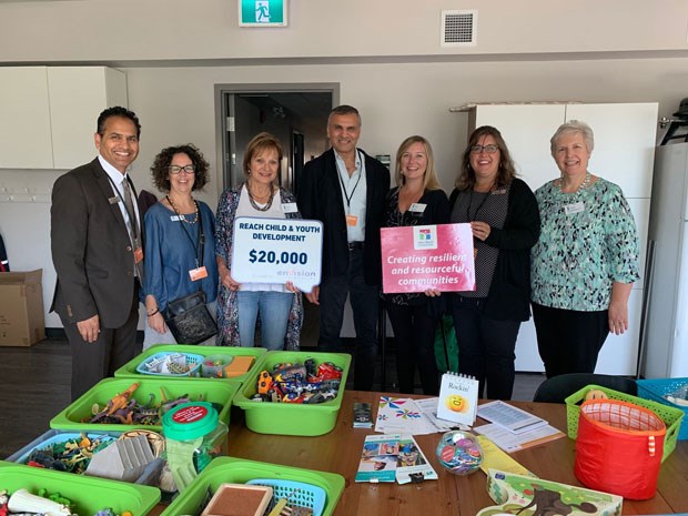 Reach Child and Youth Development Society recently received a $20,000 grant from the First West Foundation - Envision Financial Community Endowment to support its counselling program. Pictured from left are: Ken D’Sena, Sue-Lynda Bate, Renie D’Aquila, Riyaz Devji, Kristin Bibbs, Lisa Margetson and Yvonne McKenna.