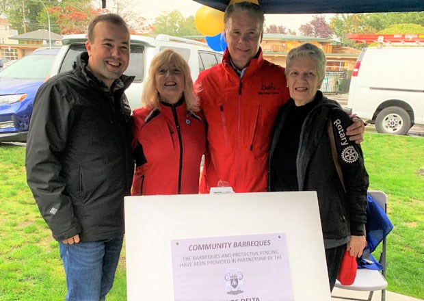 Delta Councillor Dylan Kruger and Mayor George Harvie with Rotary Club of Ladner President Bridget Jacob and project leader Irene Forcier after unveiling the dedication plaque