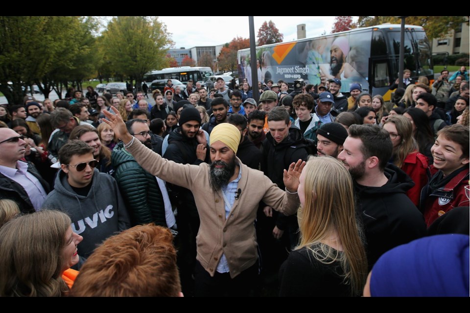 NDP Leader Jagmeet Singh greets students during a campaign stop at the University of Victoria. Oct. 18, 2019.