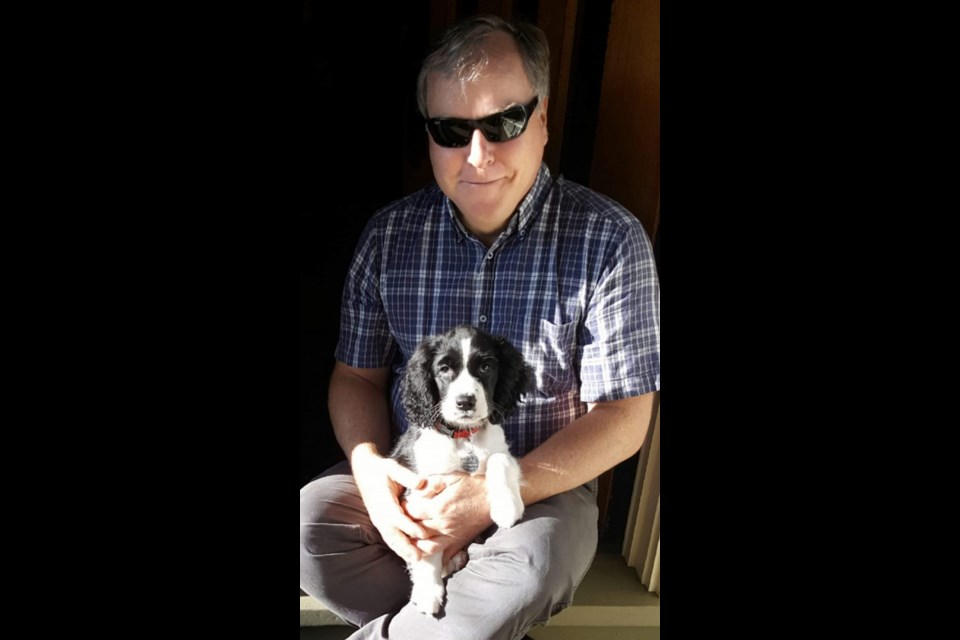 Peter Ronald and puppy Luna