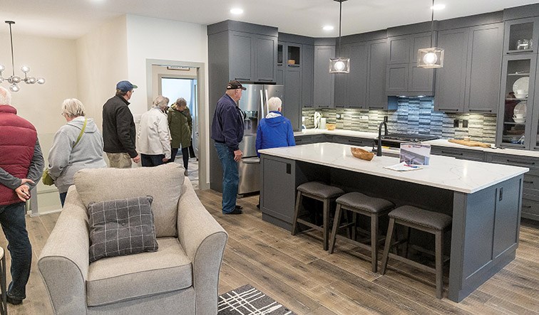 Guests tour a Lithium One Homes house at 4034 Brink Drive on Sunday during the Canadian Home Builders' Association of Northern BC’s Parade of Homes. Citizen Photo by James Doyle