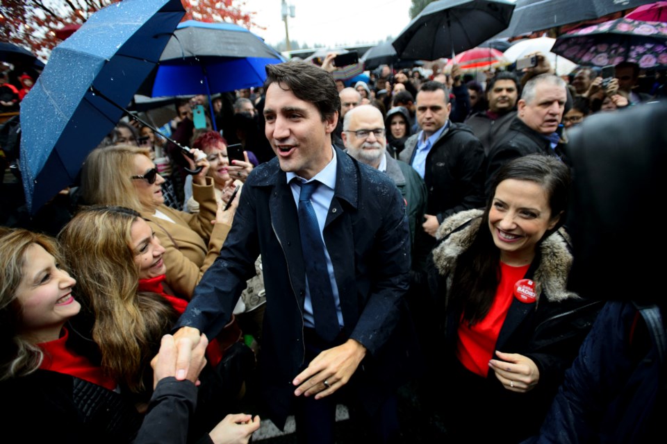Liberal leader Justin Trudeau and Liberal candidate Sara Badiei make a campaign stop in Port Moody, B.C., on Sunday Oct. 20, 2019.