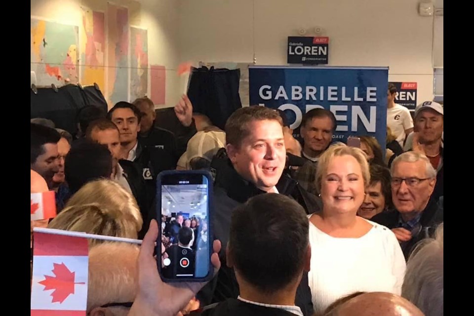 Conservative leader Andrew Scheer with local candidate Gabrielle Loren in West Van Oct. 20.