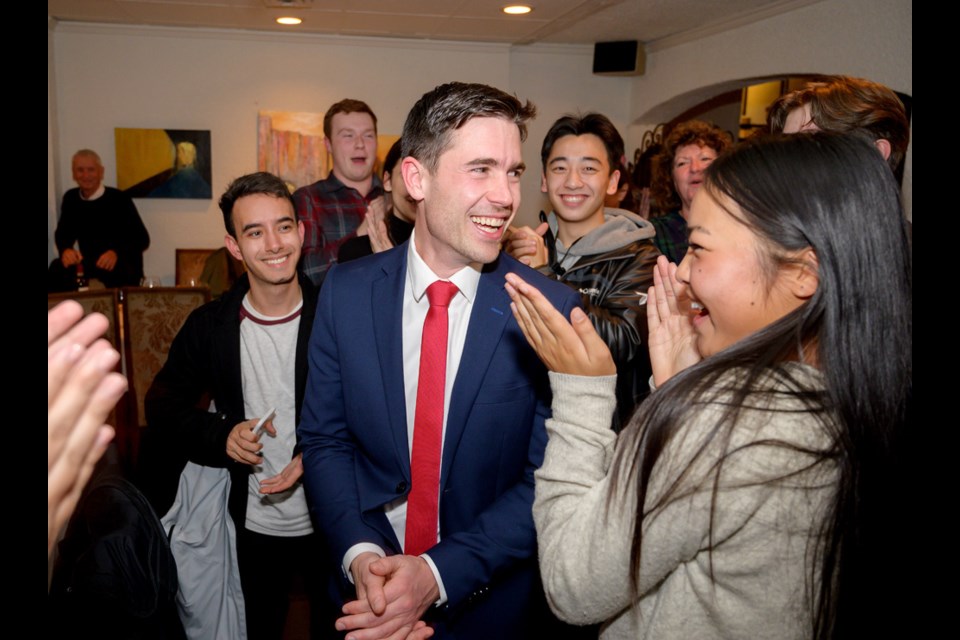 Patrick Weiler celebrates his win with well wishers at his post-election party in West Vancouver