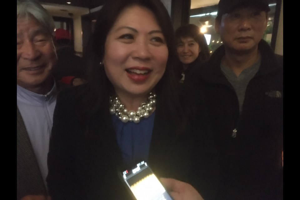 Nelly Shin surrounded by supporters on election night after winning the riding of Port Moody-Coquitlam.