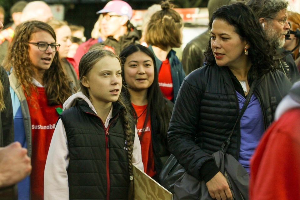Greta Thunberg marches alongside Severn Cullis-Suzuki — daughter to Canadian environmentalist icon D