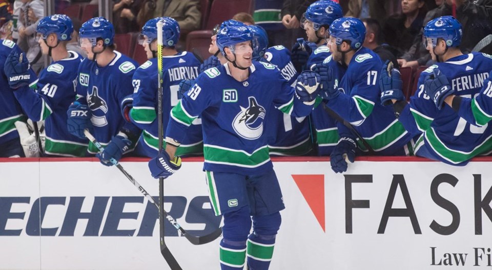 Tim Schaller celebrates a goal for the Vancouver Canucks