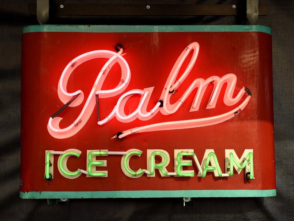 Palm Dairy franchises displayed the Palm Dairy logo in various forms of neon including portable sign