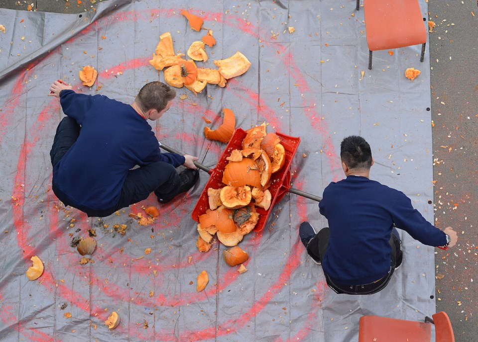 Photos: Smashing pumpkins for charity with Richmond fire crews_7