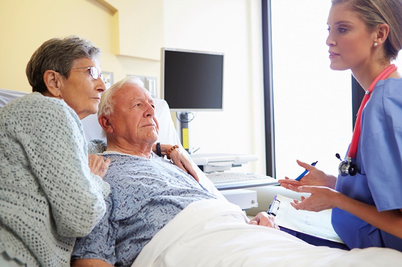 senior in hospital bed