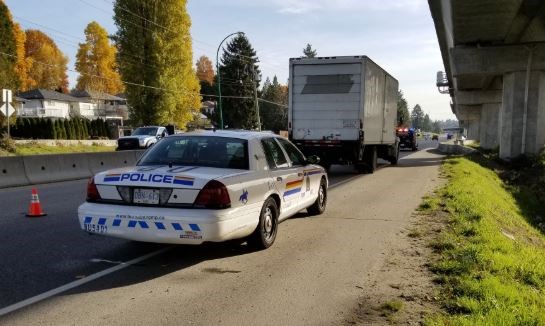 Burnaby RCMP stop a commercial vehicle on Lougheed Highway, just east of Holdom. Burnaby RCMP photo