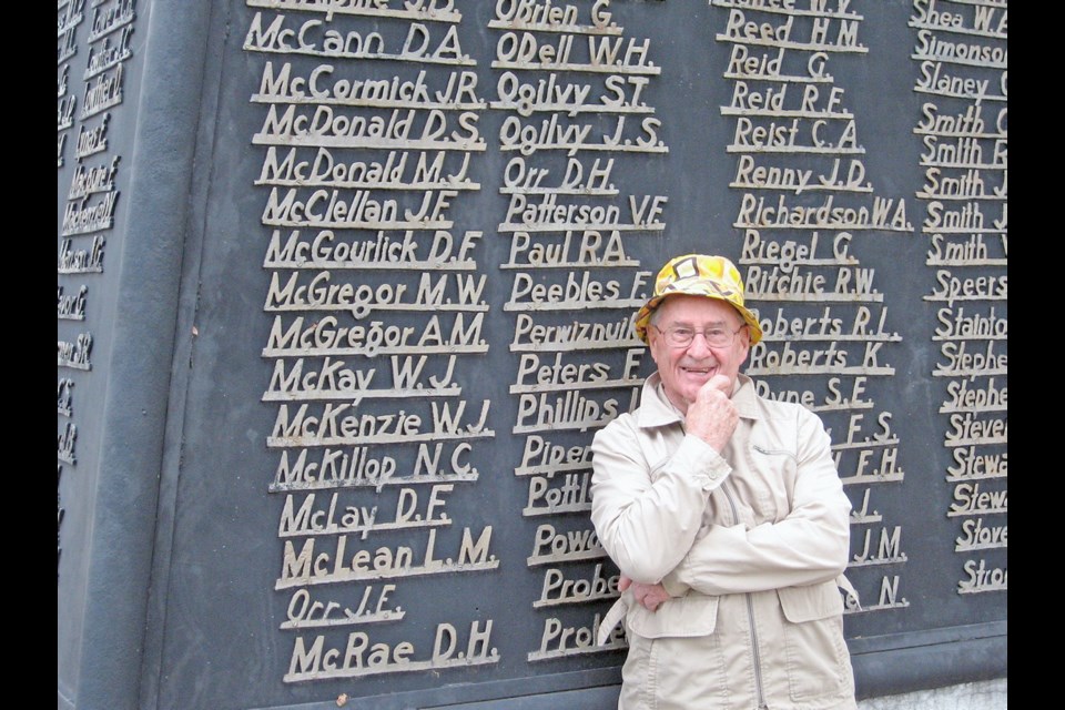 In 2006, Donald Francis McGourlick, then 85, at the cenotaph in Moose Jaw, Sask., which has his name inscribed on it. McGourlick died in 2012.