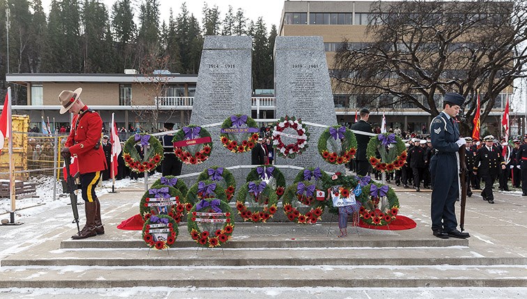 An honour guard stands watch over the cenotaph in Veterans Plaza on Monday during Remembrance Day ceremonies. Citizen Photo by James Doyle