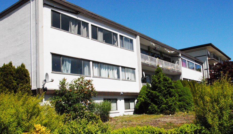 DD North Vancouver three-storey walk-up apartment building