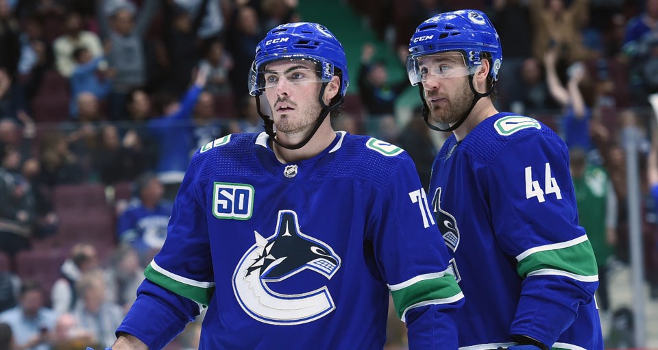 Zack MacEwen and Tyler Graovac line up for a preseason game with the Canucks.