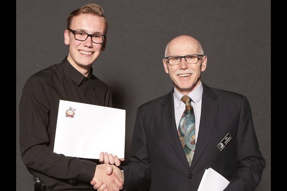 Arts Council of New Westminster vice-president Bob Crockett with NWSS student Benjamin Paul, a Hilda Cliffe Scholarship award winner.