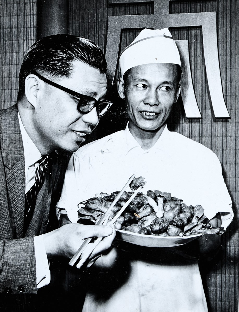 Owner Victor Louie samples his chef’s offering from Marco Polo’s 14-page menu. Photo courtesy of Tom