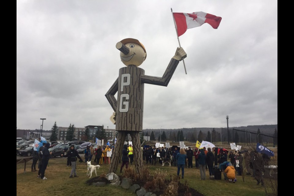 Striking faculty members and their supporters rallied around Mr. P.G. at the intersection of Highways 97 and 16 Saturday afternoon.