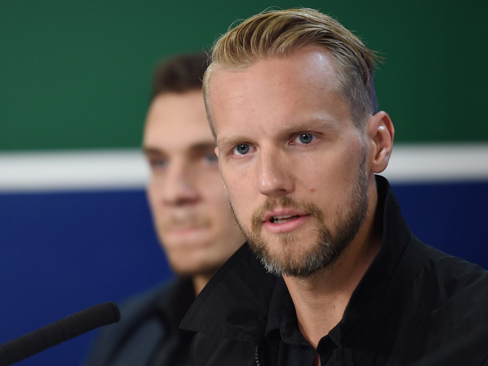 Alex Edler talks to the media at the Canucks 2019 media day.