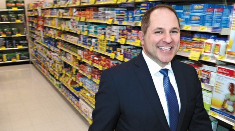 London Drugs COO Clint Mahlman walks down an aisle of one of his stores in Richmond. BIV file photo