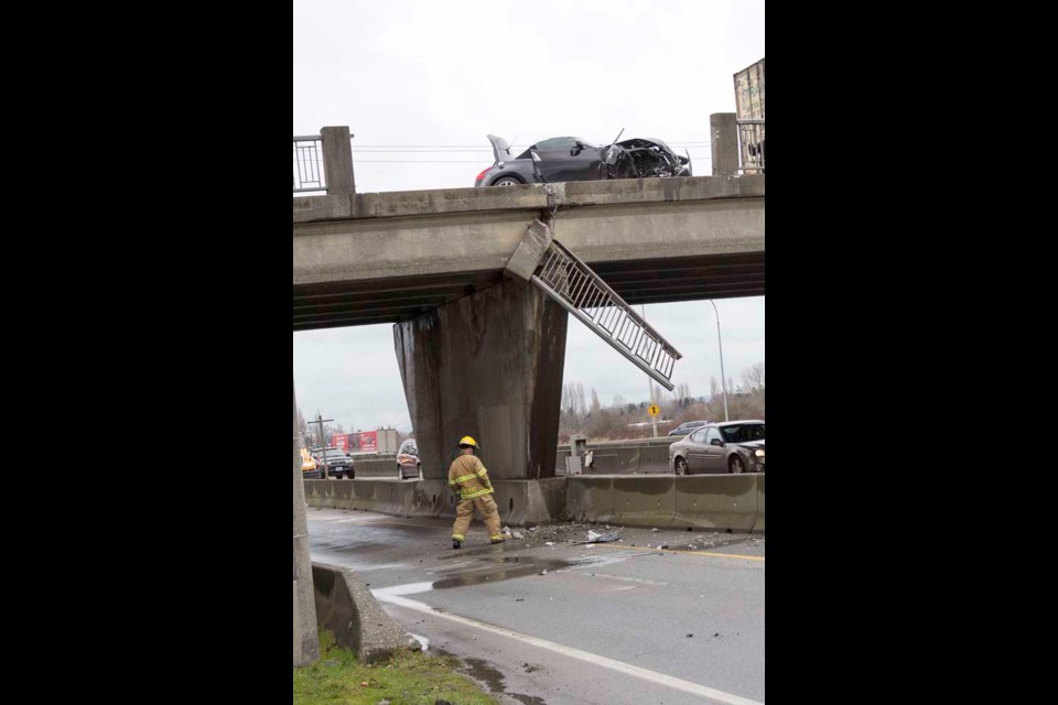 A car on the Steveston Highway overpass crashed into a guardrail earlier this afternoon, causing massive traffic delays in the area. Highway 99 was partially closed as a section of the guardrail hung precariously over one of its southbound lanes. At one point, the overpass was closed to both east and west bound traffic. Eventually, a single, alternating lane was opened.