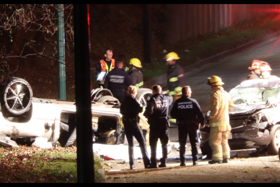 The driver of a pickup truck heading southbound on Boundary Road in Burnaby lost control and rolled the vehicle across into the northbound lanes, colliding with a car before landing on its roof. Shane MacKichan photo