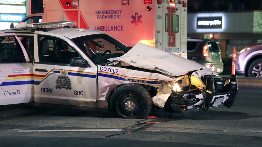 A vehicle collision involving multiple cars and a police cruiser shutdown the Lougheed Highway between Pinetree Way and Westwood Street Saturday night.