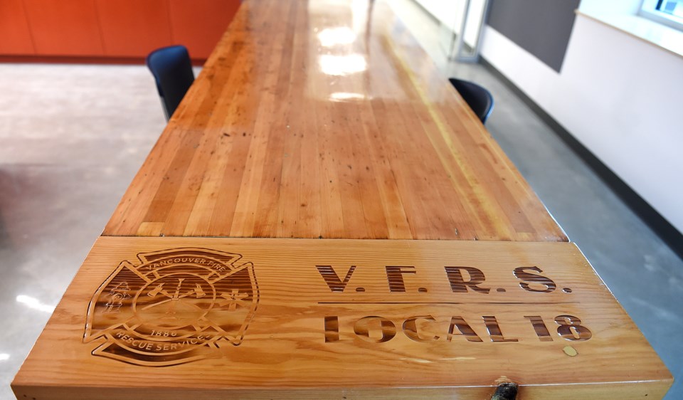 A firefighter made this wooden table out of a workbench from the old Firehall No. 5. Photo Dan Toulg