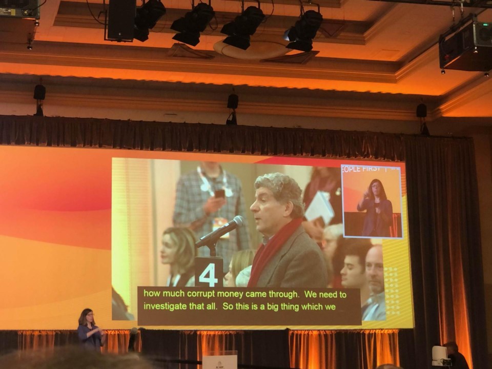 Soofi speaks at an NDP convention in Victoria where he raised concerns that Iranian linked to the re