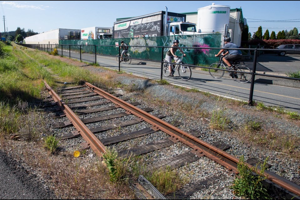 The E&N trail runs alongside unused railway tracks near Devonshire Road in Esquimalt.