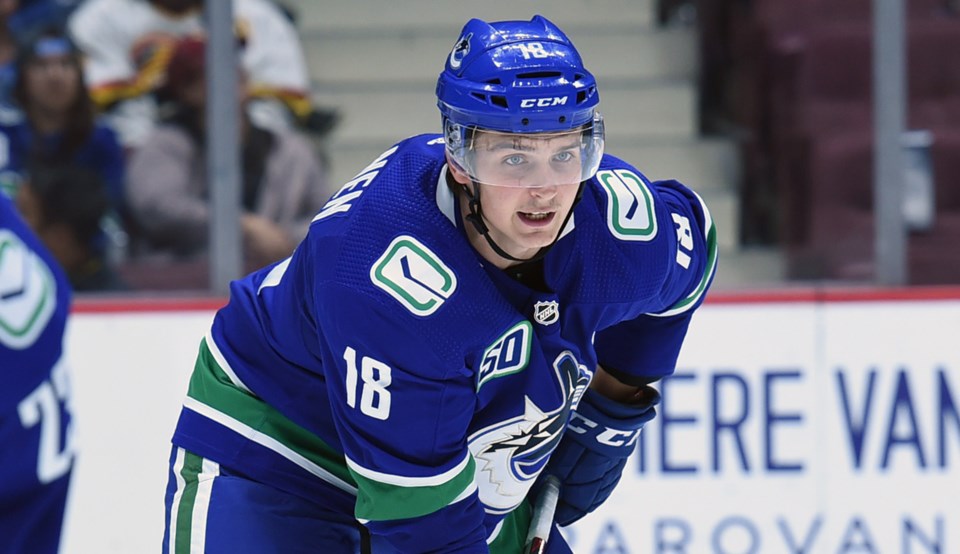 Jake Virtanen prepares for a faceoff during the Canucks 2019 preseason.