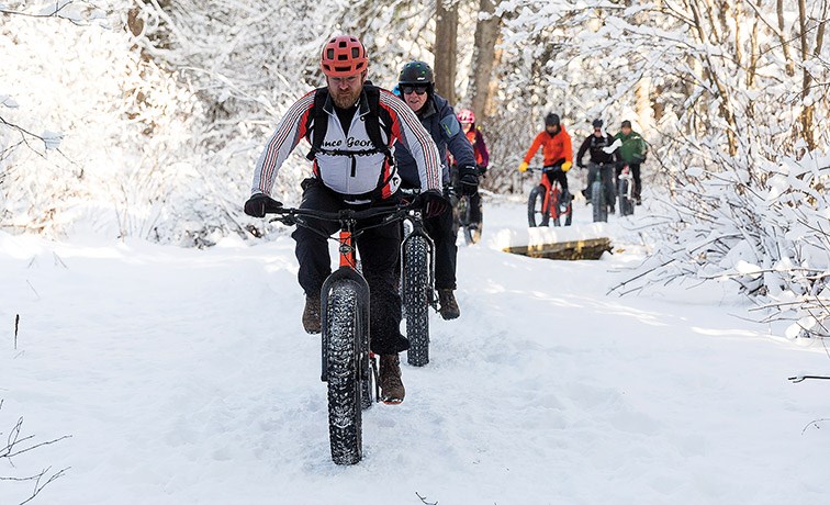 Citizen Photo by James Doyle. Cyclists make their way along the Greenway Trails on Saturday afternoon while participating in the Prince George Cycling Club’s Fat Bike Season Opener.