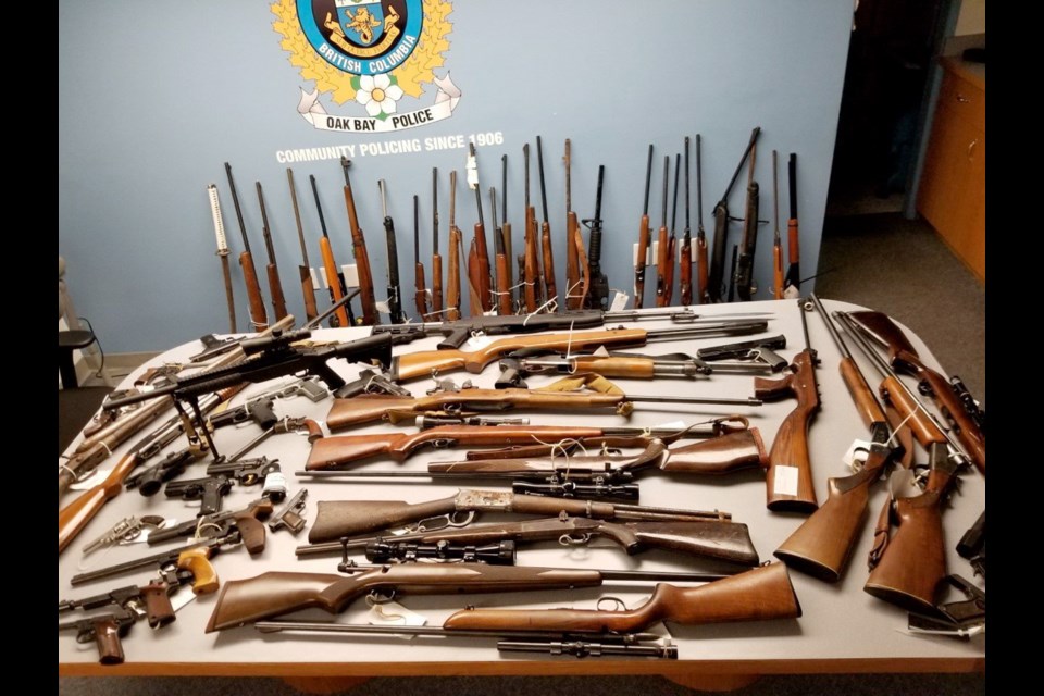 Most of the 68-firearm haul was turned in by members of the public, said Oak Bay Deputy Police Chief Ray Bernoties.