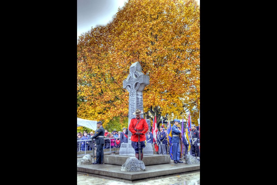 Over a thousand spectators braved the possibility of high winds and rain to attend the Remembrance Day service at the cenotaph in front of city hall. The expected bad weather held off long enough for the almost 900 participants to parade proudly and stand tall for the service.