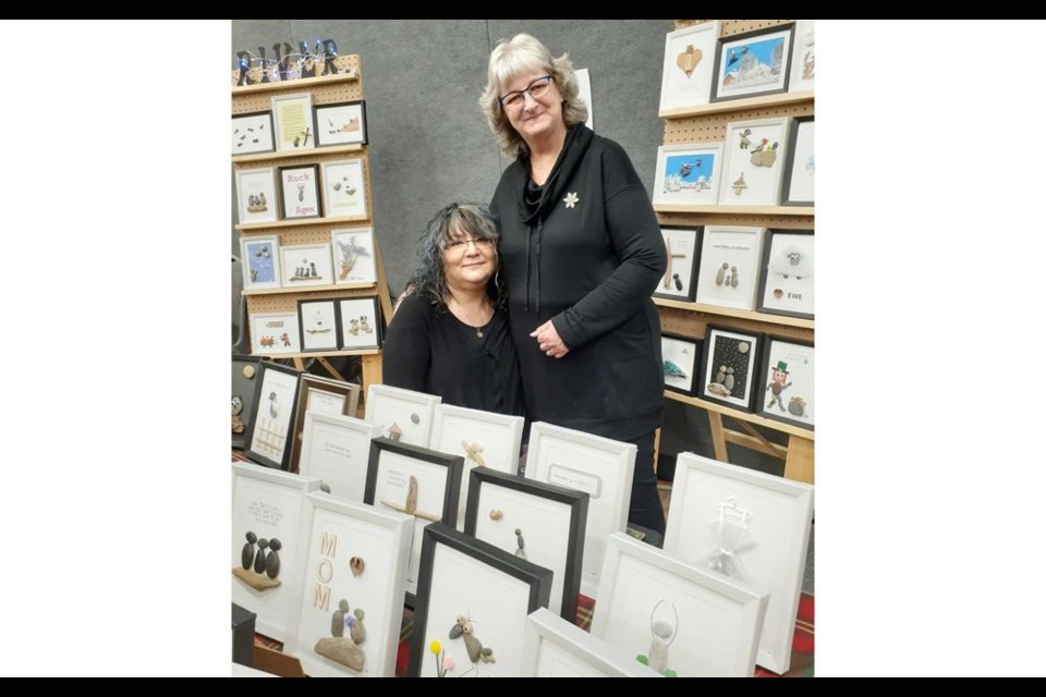 Patsy Meehan, left, and Heather Kovachich, of River Stone Art had their booth set up at the Winterfest Market at the Civic Centre. The fair goes until 4 p.m. today and then again from 10 a.m. to 4 p.m. Sunday.