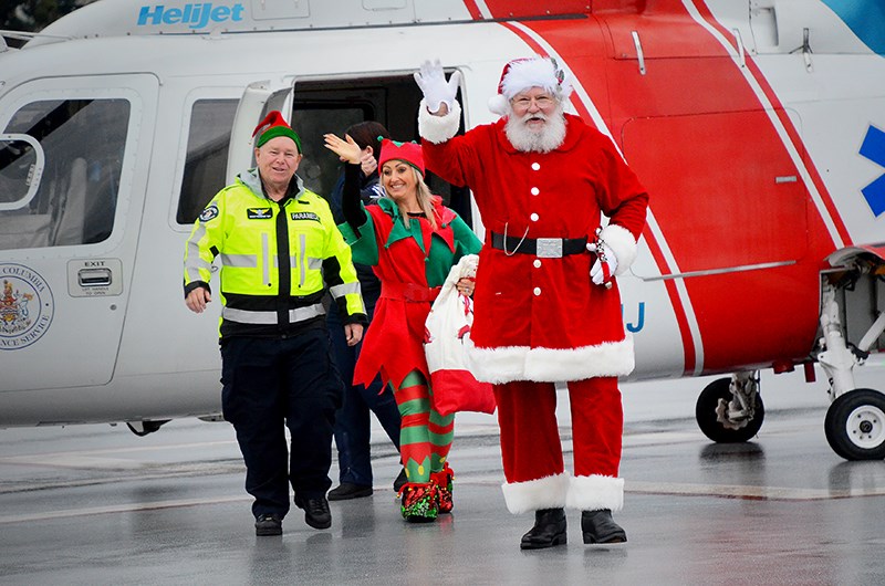 Santa made his annual helicopter trip to Royal Columbian Hospital Tuesday, handing out stuffed bears and holiday cheer to sick kids and newborn babies.