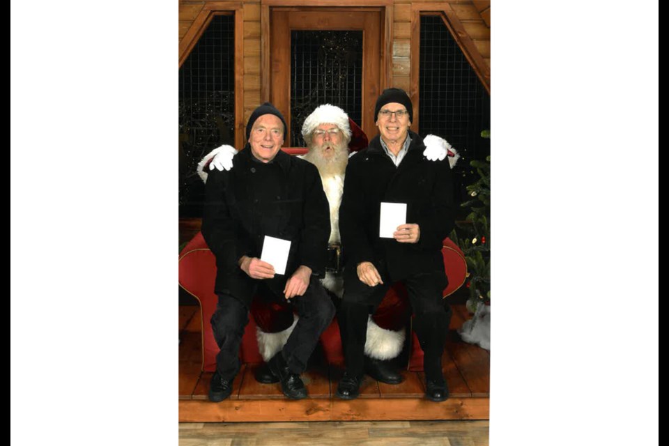 Bob Seibold (left) with lifelong friend Howard Bennett and Santa last week at Richmond Centre. The pair wanted to recreate the same photo taken 73 years ago, when they were four. Photo submitted